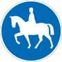 Blå skylt med vit siluett av häst och ryttare